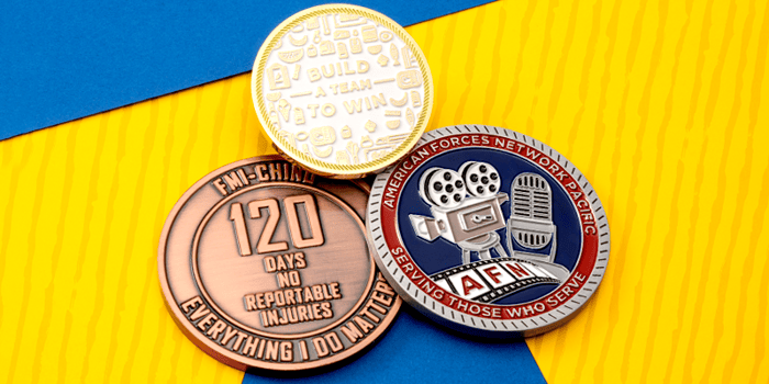 Challenge coins designed to celebrate service